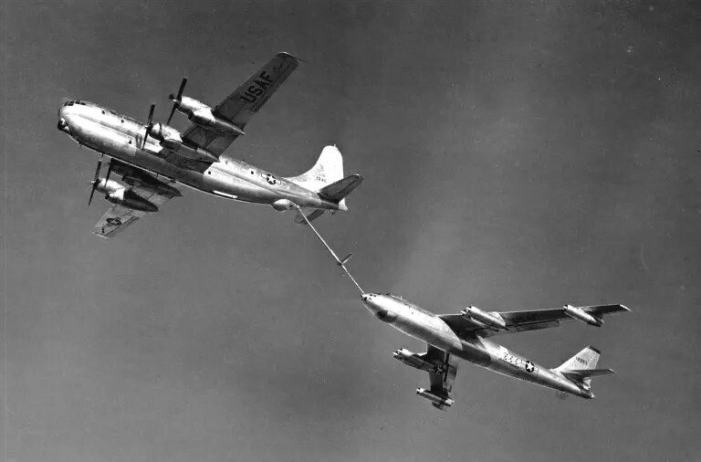 A KC-97 tanker refuels a B-47 Stratojet in flight